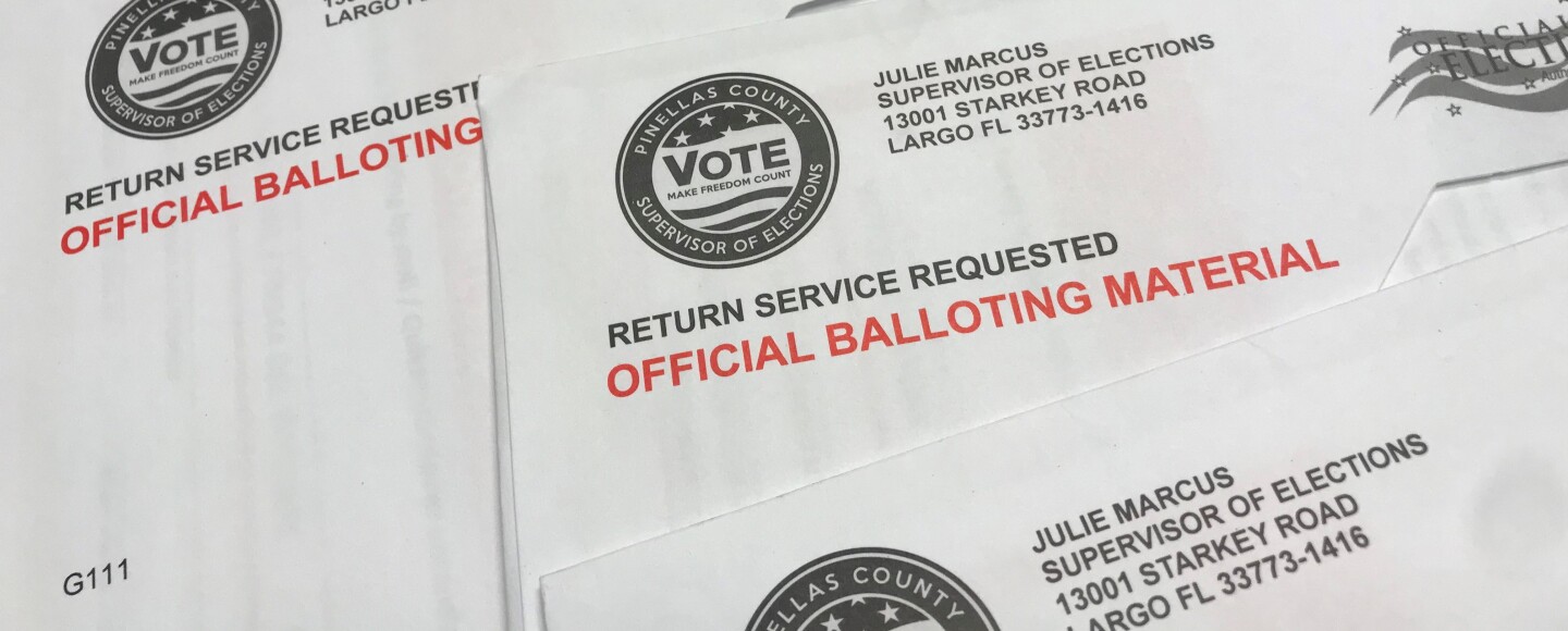 stack of mail-in ballots  