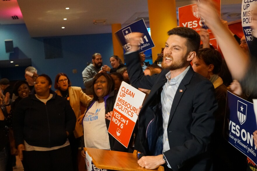 Benjamin Singer, communications director for Clean Missouri, announces victory in the contest to pass Amendment 1 to supporters at Flamingo Bowl in St. Louis.