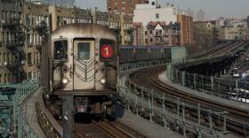 A subway train pulls into a station in New York, Monday, Feb. 21, 2022. (Seth Wenig/AP)
