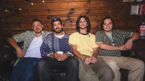 Eggy band members on a couch