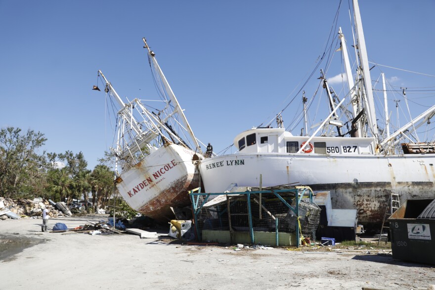 A fishing marina across from Fort Myers Beach, Fla., sustained significant damage when dozens of shrimping boats were forced on land by Hurricane Ian on Oct. 28, 2022.