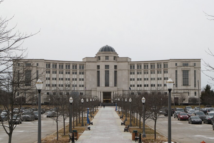 The Hall of Justice is seen from a distance on a gray day in Lansing.