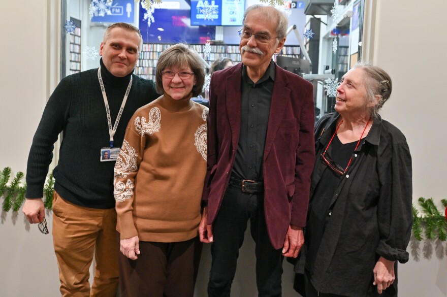 George Graham poses for a photo with broadcasting colleagues during his Dec. 16, 2025 retirement party at WVIA. From left: Paul Lazar, director of radio programming; host and producer Lisa Mazzarella; Graham; and senior producer and program host Erika Funke.