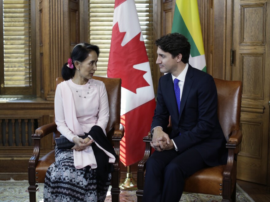 Aung San Suu Kyi, Myanmar state counselor, left, speaks with Canadian Prime Minister Justin Trudeau in Ottawa last year.