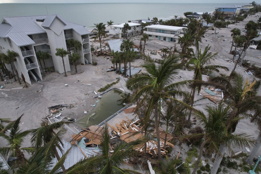 FILE - Debris lies scattered on Manasota Key, Fla., following the passage of Hurricane Milton, Friday, Oct. 11, 2024. (AP Photo/Rebecca Blackwell, File)