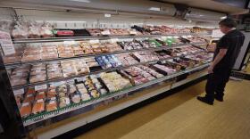 A man looks at beef in the meat department at Lambert's Rainbow Market, on June 15, 2021 in Westwood, Mass. The Labor Department said Thursday, Feb. 10, 2022, that consumer prices jumped 7.5% last month compared with a year earlier, the steepest year-over-year increase since February 1982. The acceleration of prices ranged across the economy, from food and furniture to apartment rents, airline fares and electricity.