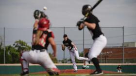 Juliette Kladko, center, pitches during the third day of tryouts for the Women's Professional Baseball League, Sunday, Aug. 24, 2025, at the Washington Nationals Youth Baseball Academy in Washington. (Julia Demaree Nikhinson/AP)