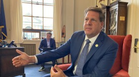 Chris Sununu inside his office