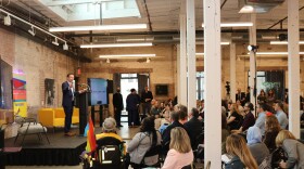 U.S. Senator Chris Murphy speaks to a crowd of about 75 people at NXHVN for the Creating Community Summit in New Haven.