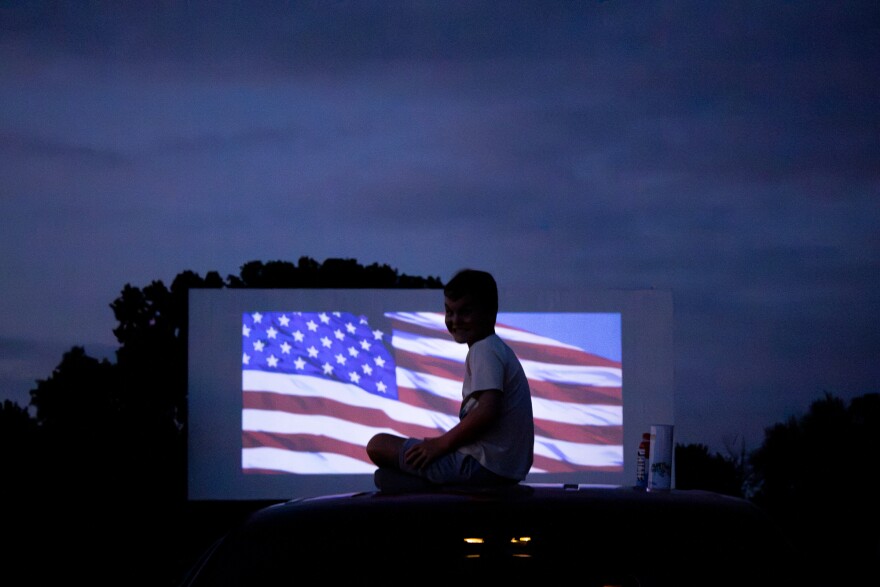 The top of the family vehicle can be a great place to watch a movie at Wichita's Starlite Drive-In Theater.