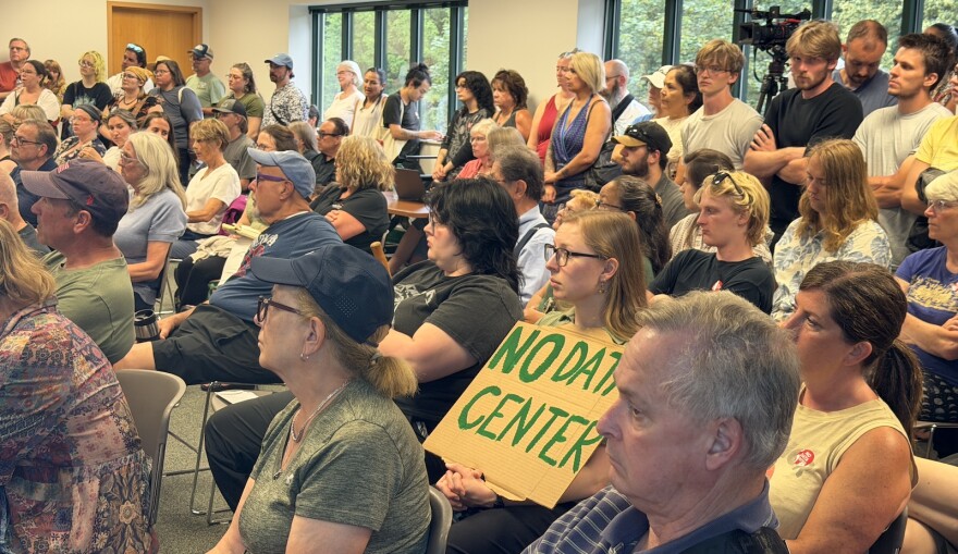 The Garfield Township Planning Commission meeting saw an overflow crowd as people voiced support for a possible temporary ban on data centers. (Photo: Vivian La/IPR News)