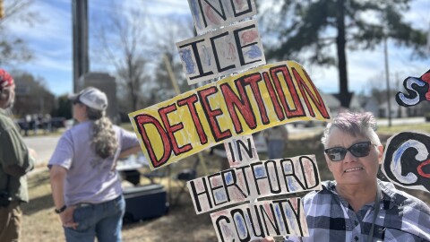 Lifelong Ahoskie resident Kim Hoggard participates in a protest on Saturday, Mar. 14, 2026 against a new immigration detention facility in Hertford County.