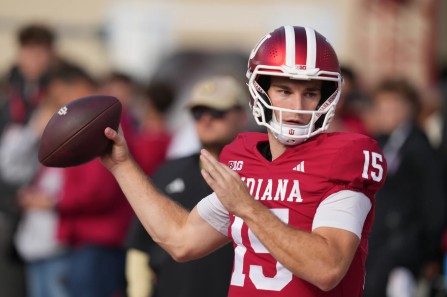 Indiana quarterback Fernando Medoza throws before an NCAA college football game against Wisconsin, Saturday, Nov. 15 2025, in Bloomington, Ind.