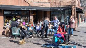 People sit outside of Paradise Bakery on March 18, 2026. The newly formed Aspen Area Community Land Trust is working on identifying properties it can acquire to preserve for affordable local businesses. It has not yet met with any local businesses.