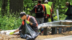 A cleanup crew is seen alongside a state highway in this photo provided by the Pennsylvania Department of Transportation. PennDOT and the Pennsylvania State Police are looking to raise awareness of littering along the highways, as well as opportunities for volunteers to participate in the northeast region's Adopt-A-Highway program.