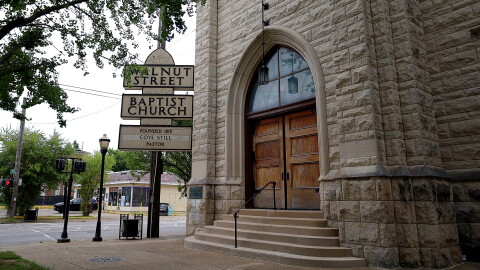 The Walnut Street Baptist Church is located at the corner of South 3rd and St. Catherine streets.