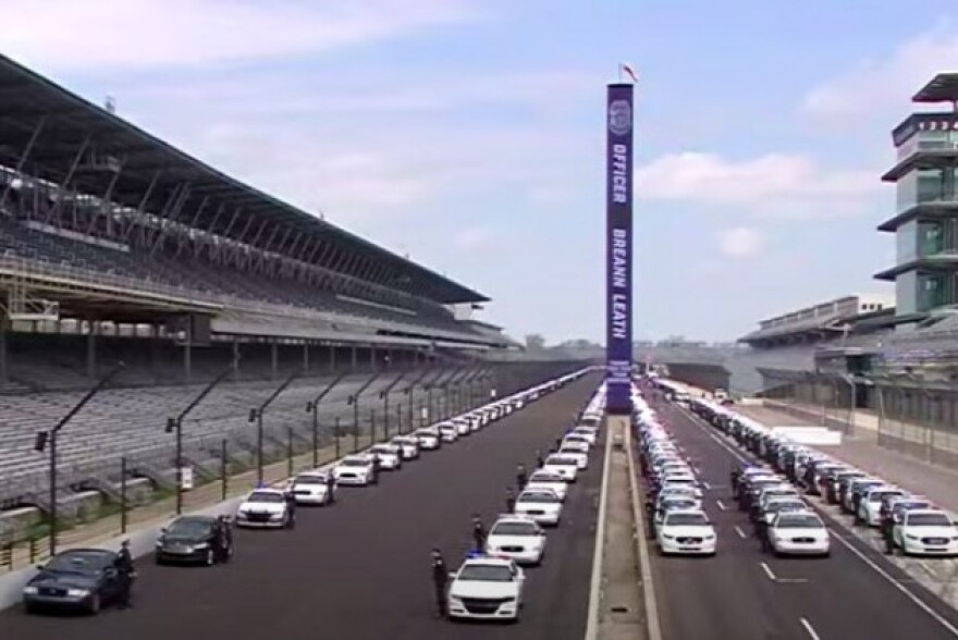 Members of the IMPD line the Indianapolis Motor Speedway during services for Officer Breann Leath.