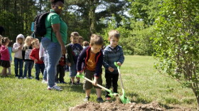Children from the Navy's Child Development Center in Chesapeake participe in an Arbor Day event. Hampton Roads, and specifically Norfolk, are among places where demand for on-base childcare is the highest. (Photo courtesy of Department of Defense)