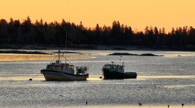 Boats on the Narraguagus River near Milbridge at dawn.