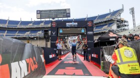 A racer finishes the IRONMAN 70.3 triathlon inside Beaver Stadium in June, 2024. Happy Valley has hosted the triathlon every year since 2023, but 2026 will be its first time hosting a North American Championship. 