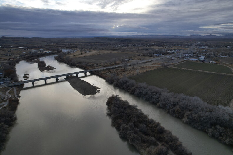 The Green River, a tributary of the Colorado River, flows on Thursday, Jan. 25, 2024, in Green River, Utah. (AP Photo/Brittany Peterson)