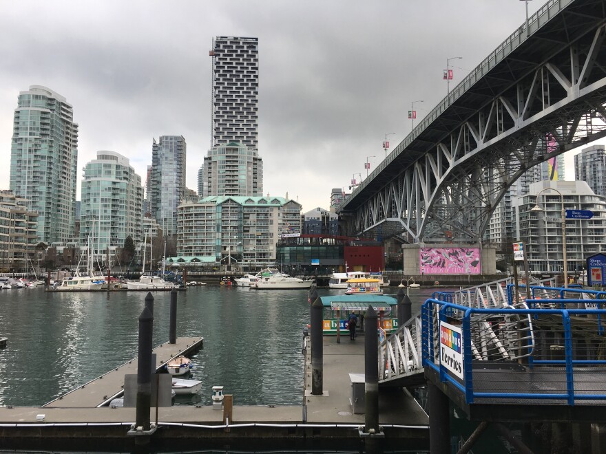 The Granville Street Bridge leads to downtown Vancouver, whose skyline of gleaming apartment towers hugging the waterfront is reminiscent of Hong Kong.
