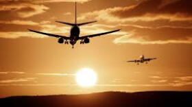 Picture of airplane in yellow sky