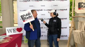 A Volunteer at St. Louis Public Radio's Earth Day Photo Booth