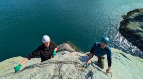 Kiara Hylton and Rahsaan Gregg make their way across one of three climbing routes at the Halutu Sky walk, a via ferrata tour set to launch next year in Haines.