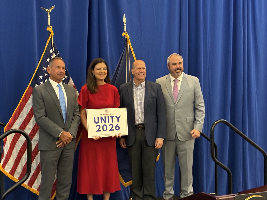 GOP candidates Anthony DiLorenzo, Gov. Kelly Ayotte, and John E. Sununu pose with RNC Chairman Joe Gruters at Unity Breakfast in Concord, Monday.
