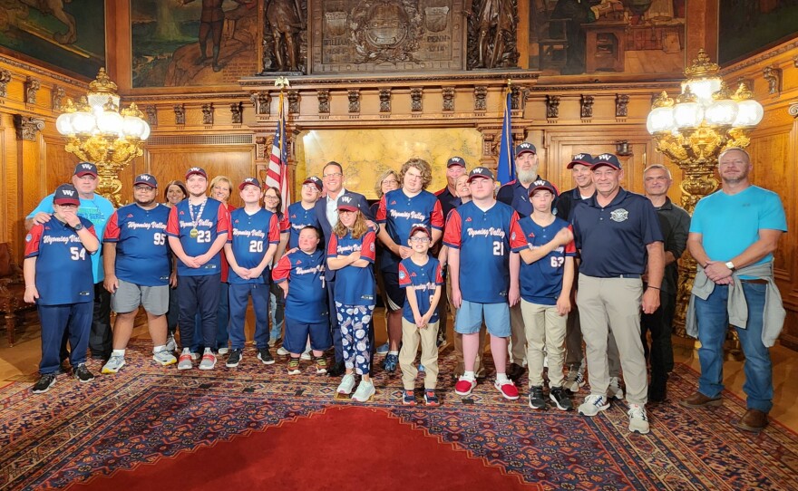 The Wyoming Valley Challenger team poses for a photo with Gov. Josh Shapiro.