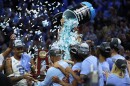 The North Carolina Tar Heels celebrate after defeating the St. Peter's Peacocks 69-49 in the Elite Eight round game of the 2022 NCAA Men's Basketball Tournament at the Wells Fargo Center on Sunday in Philadelphia.