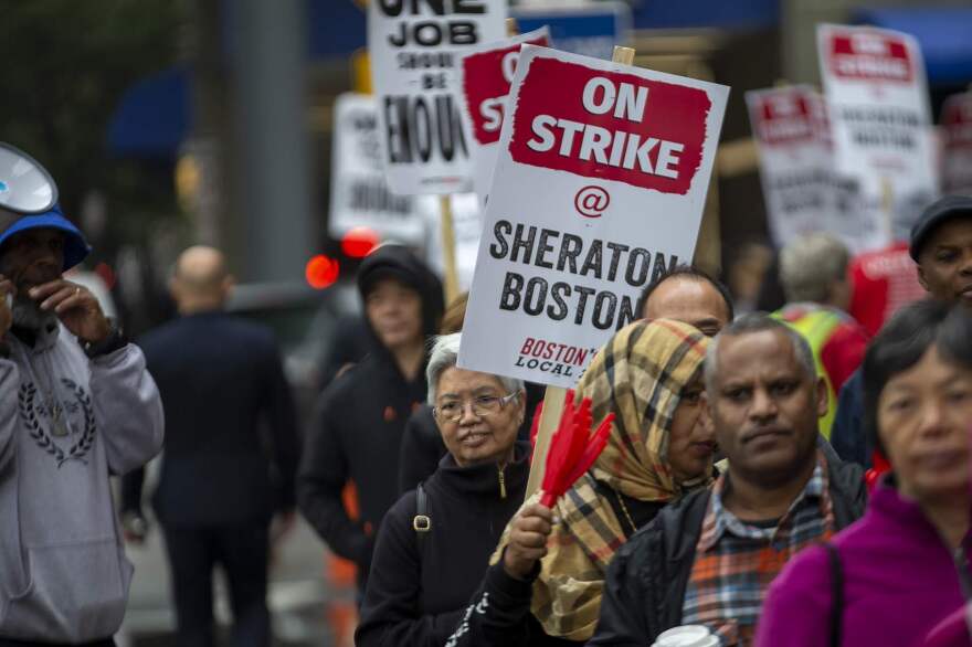 Marriott workers picket in front of the Sheraton Boston on October 3, 2018. (Jesse Costa/WBUR)