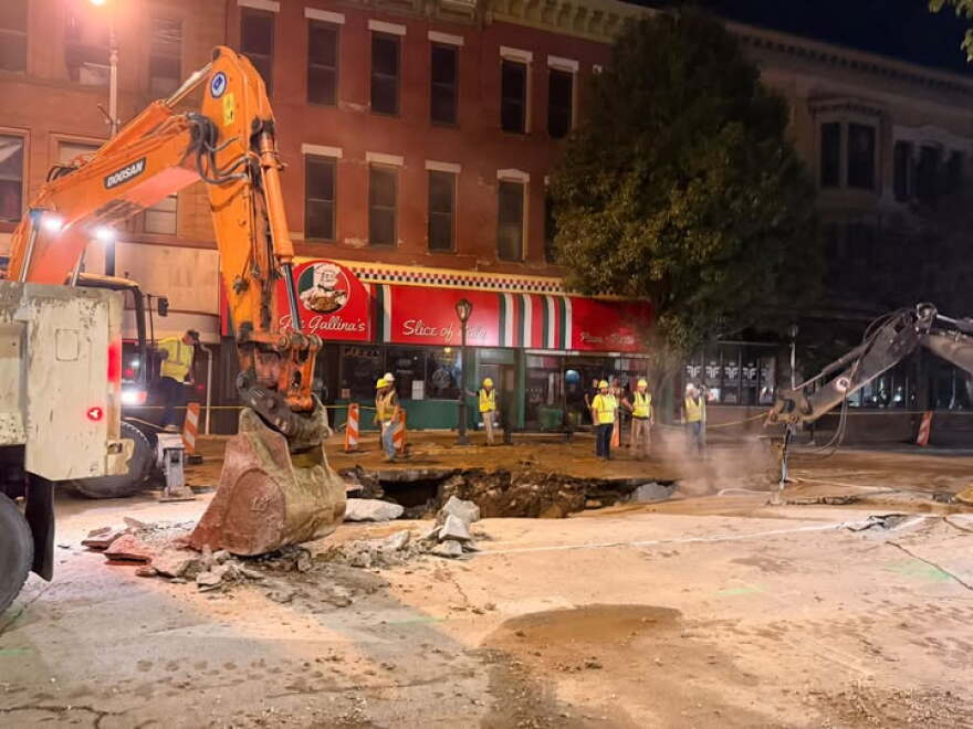 Crews work to repair a water main along Monroe St. in downtown Springfield on Aug. 27, 2026.