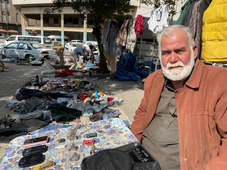 Basim Mohamed Darweesh, a Baghdad street vendor, has several old watches, some cell phones and a pile of jewelry on a folding table. He says he can no longer work at the market past noon most days even in the cooler winter months: "The midday sun makes my head boil."