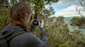Ella Marcil with her camera on Kauaʻi