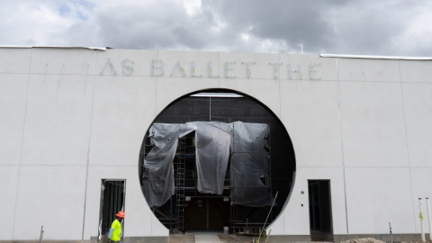 A construction worker walks by Texas Ballet Theater’s Fort Worth studio, under renovation at 1500 Mall Circle on March 6, 2026. The updated building’s entrance is called The Oculus, company board member Anne T. Bass said.
