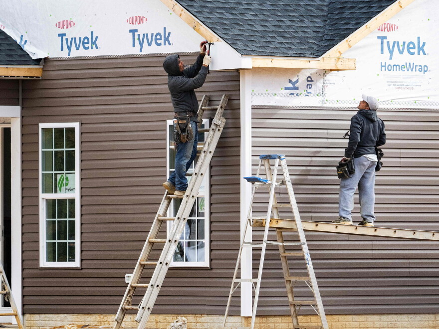 Siding Job U.S. hiring cooled slightly in October. That could help to ease ...