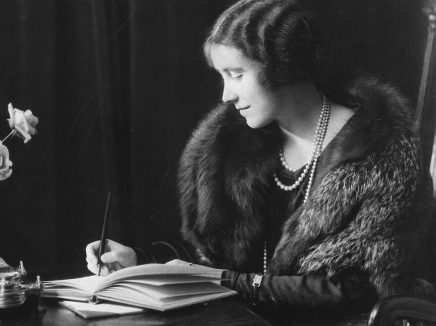 Lady Elizabeth Bowes-Lyon, later Queen Elizabeth the Queen Mother, writing in the year before her 1923 marriage to the Duke of York, later King George VI. Considered the beauty of her generation, some wonder if she actually had hoped to marry his older brother.