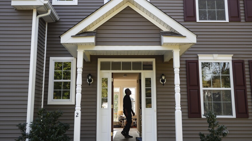 A new homeowner tours his new place in Washingtonville, N.Y. earlier this month.