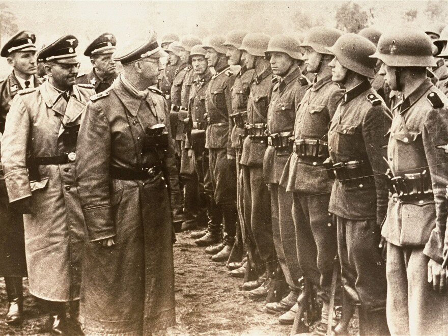 A June 3, 1944, photo provided by the U.S. Holocaust Memorial Museum shows SS chief Heinrich Himmler (center) as he reviews troops of the Galician SS-Volunteer Infantry Division.