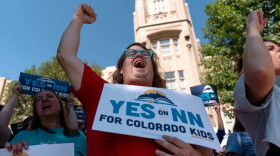Supporters gather at the “Yes for Colorado Kids” campaign kickoff in support of Proposition NN at Denver West High School July 17, 2026, in Denver. Proposition NN seeks to bolster under-resourced public schools by using retained tax revenue to boost teacher salaries, lower class sizes, and expand vocational education.