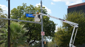 The city's public works department could be seen hoisting Durango signs into place this week