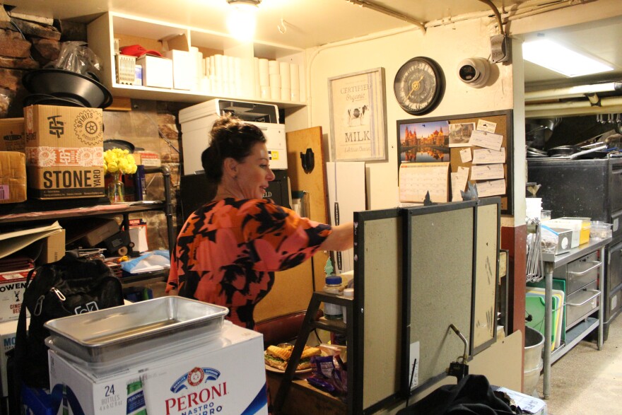 Angie Stanford’s “office” is tucked in a corner of her restaurant’s kitchen next to the freezer. She shows notes of encouragement from customers on May 22, 2026.