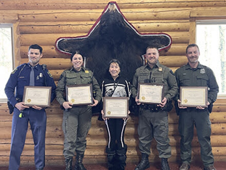 (Left to right) Michigan State Police Trooper Paul Maxinoski, Michigan Department of Natural Resources Conservation Officer Jennifer Lehto (Hanson), Susan Barrette of Bergland, Conservation Officer Zach Painter and Great Lakes Indian Fish and Wildlife Commission Capt. Steve Amsler.