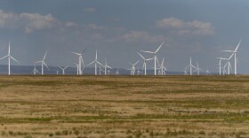 Wind turbines are seen from Interstate-84, July 9, 2023, near Hammett, Idaho. The federal Bureau of Land Management’s preferred alternative for a proposed large-scale wind energy farm in southern Idaho would shrink its size by nearly half and move it farther from a national historic site.