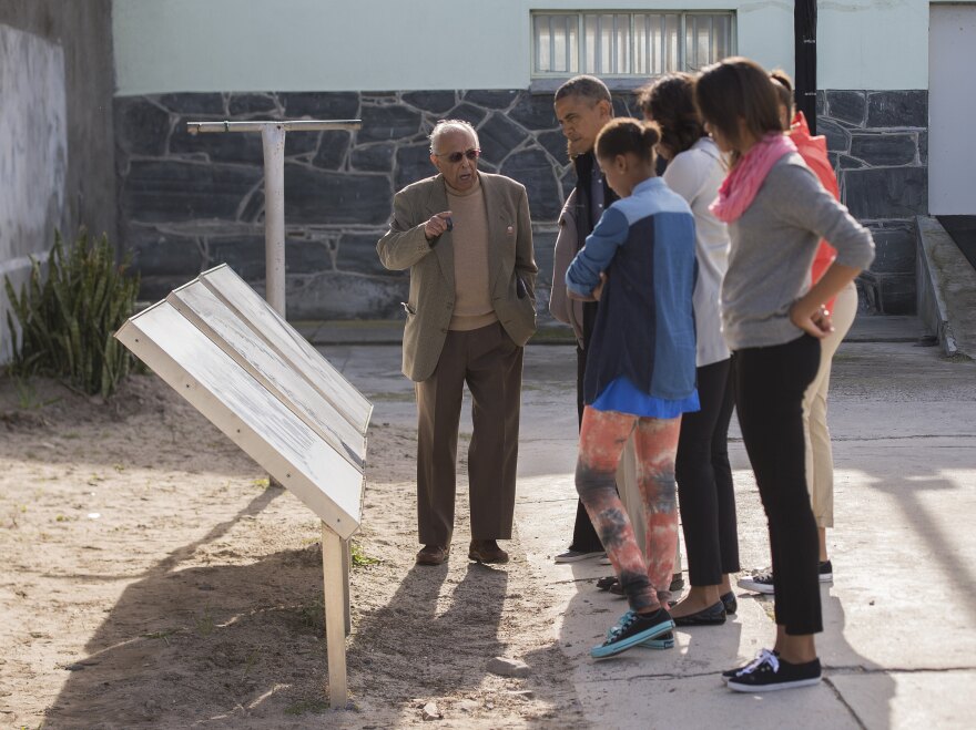 Kathrada (left), showed the Obama family around Robben Island on June 30, 2013. Kathrada chose to live on the island in his later years.