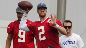 Indianapolis Colts quarterback Carson Wentz (2 ) throws as the team practiced at the NFL football team's facility, Thursday, May 27, 2021, in Indianapolis.