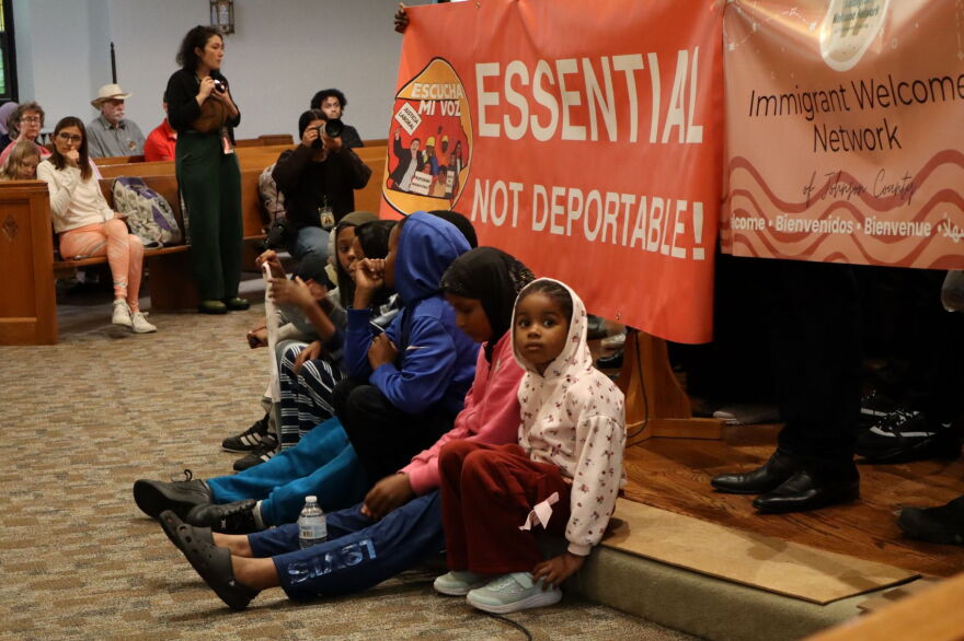 Fatou Traore's friends brought their children to the rally calling for Traore's release. Multiple advocates said it was cruel to pull a mother from her family.