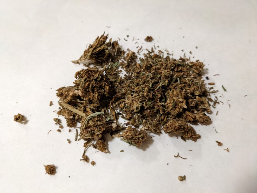 A small pile of dried marijuana flower.